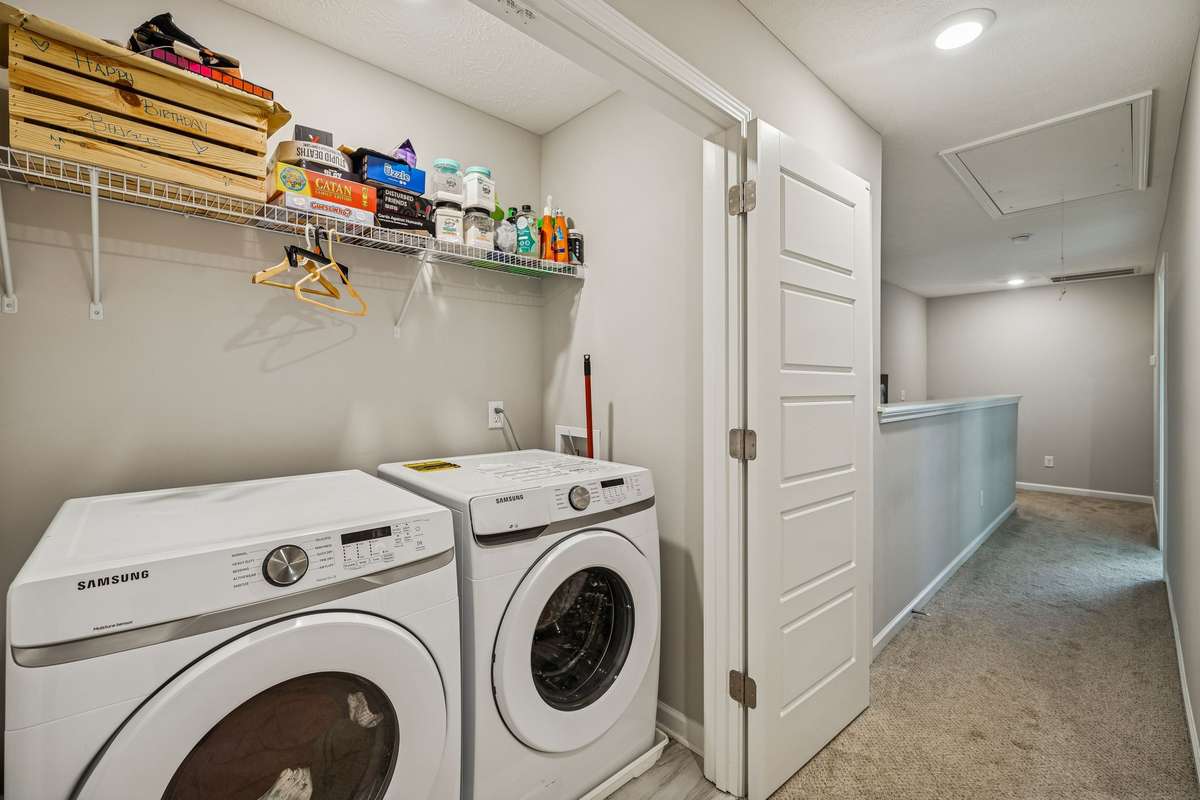 The laundry room is conveniently located upstairs.