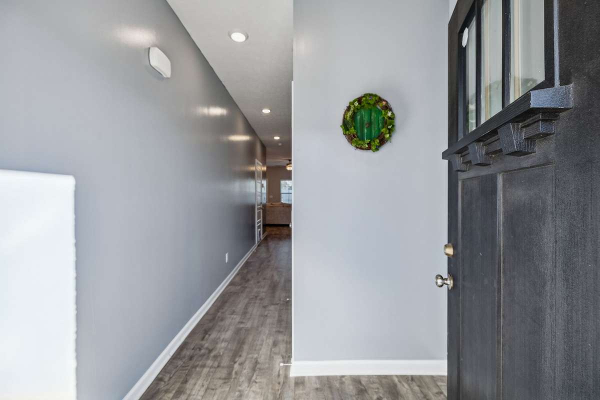 The main level of this home has easy to maintain laminate flooring.