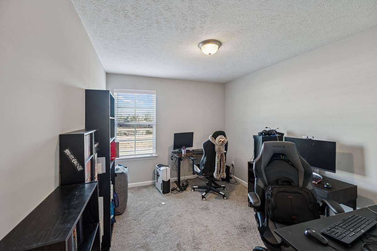 The third bedroom is also located in the rear of the home and is currently being used as a home office.