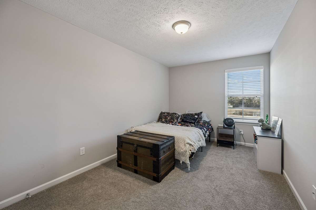 The second bedroom is located in the rear the home and has lots of space for your furniture.