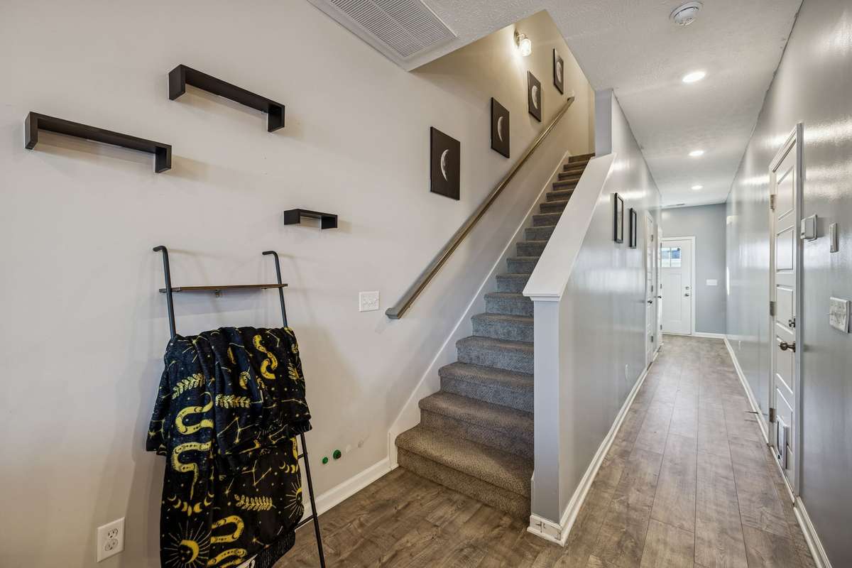 Let's go upstairs to check out the bedrooms and full bathrooms.