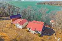 Rare opportunity to buy a move in ready home direct on KY Lake in Dover, TN.