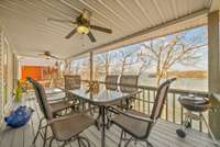 Your massive covered deck is a perfect spot to entertain or simply watch the sunset over KY Lake. You can see the Paris Landing Bridge and State Park in the distance.