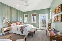 Primary Suite features custom millwork wall, designer lighting. Truly feels like a treehouse with all the windows and natural light, Plus the bonus of your private screened porch!