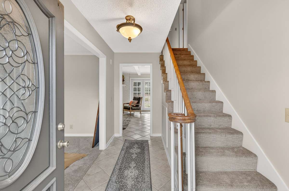 All new carpet and paint throughout and tile floors make for an easy home to maintain with children or pets
