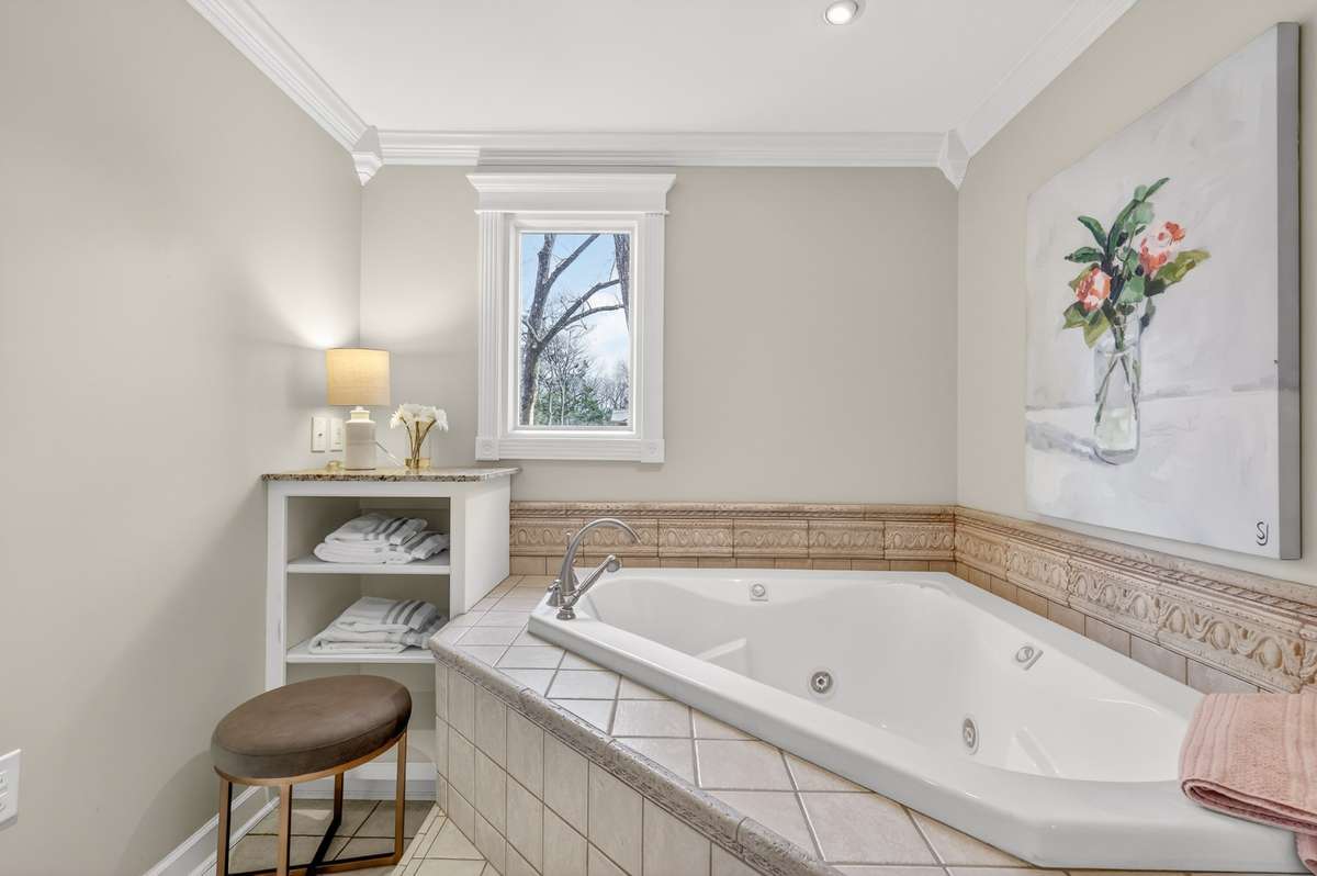 Jetted tub and custom storage cabinet