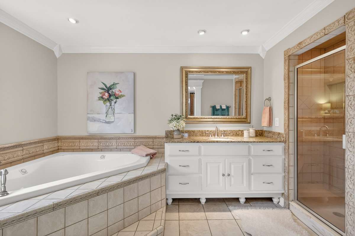 Large tub, walk in shower and a custom solid wood cabinet