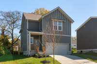 Charming and cozy, this adorable home features a delightful private side yard, perfect for relaxing or entertaining. Enjoy the tranquility!