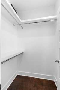 Built-in shelving for organization on the owner's closet!