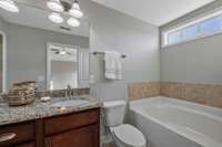 Ensuite Primary Bath w/ two sink & granite - deep soaking Garden Tub