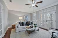 Spacious Living Area w/ Double Doors leading to Balcony