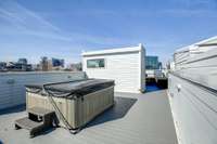 This jacuzzi will remain and was lifted up here by a crane- no other units in this development have one!