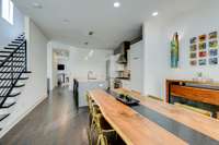 The kitchen has a spacious pantry as well as additional cabinet pantry storage.