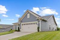 2 Car garage with 2 additional parking spaces in the driveway
