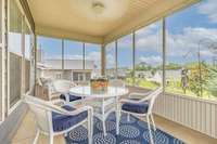 Enjoy the warm sunny days in the enclosed back porch - another incredible upgrade