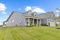 This stunning home features lush manicured landscaping