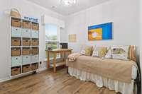 Bedroom 3 is currently being utilized as a craft room (cornice boards throughout the home do not convey)