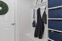 Seller added this custom mudroom allowing ample space for storage