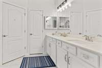Double vanities allow ample space and tons of cabinetry