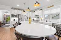 This fantastic island is great for preparing incredible culinary creations with tons of workspace and cabinets, and entertaining