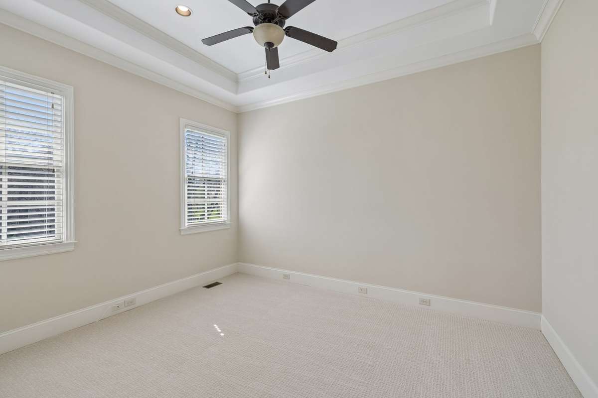 Second secondary bedroom adjoining Jack & Jill bath.  New carpet, elevated ceiling.