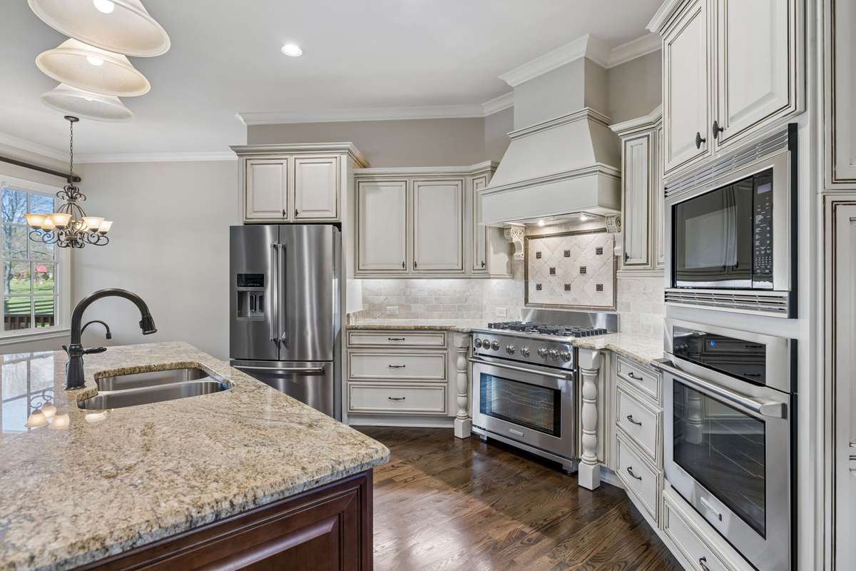 Lots of light in this kitchen that opens to breakfast room and huge great room.