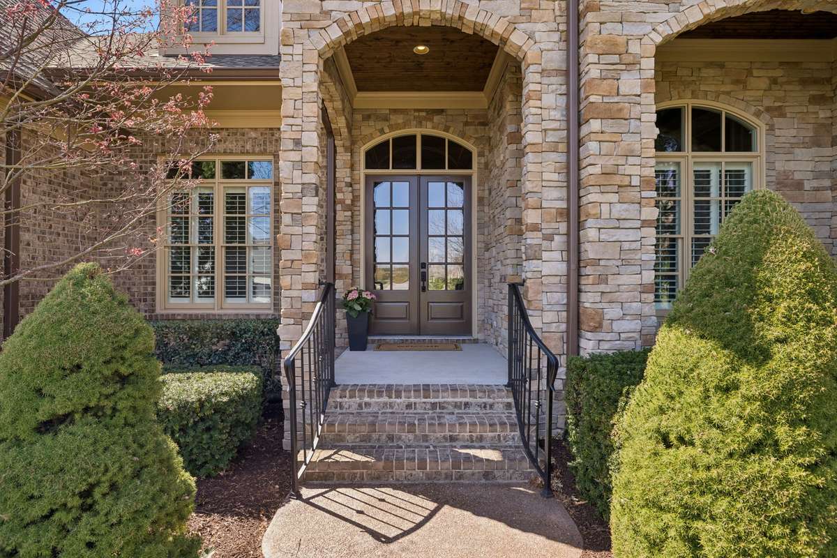 Very few steps into front entrance.  One step into home from garage.