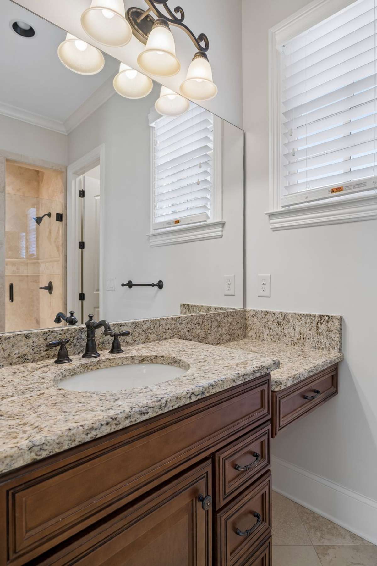 Fourth bedroom bathroom with shower and walk in closet.