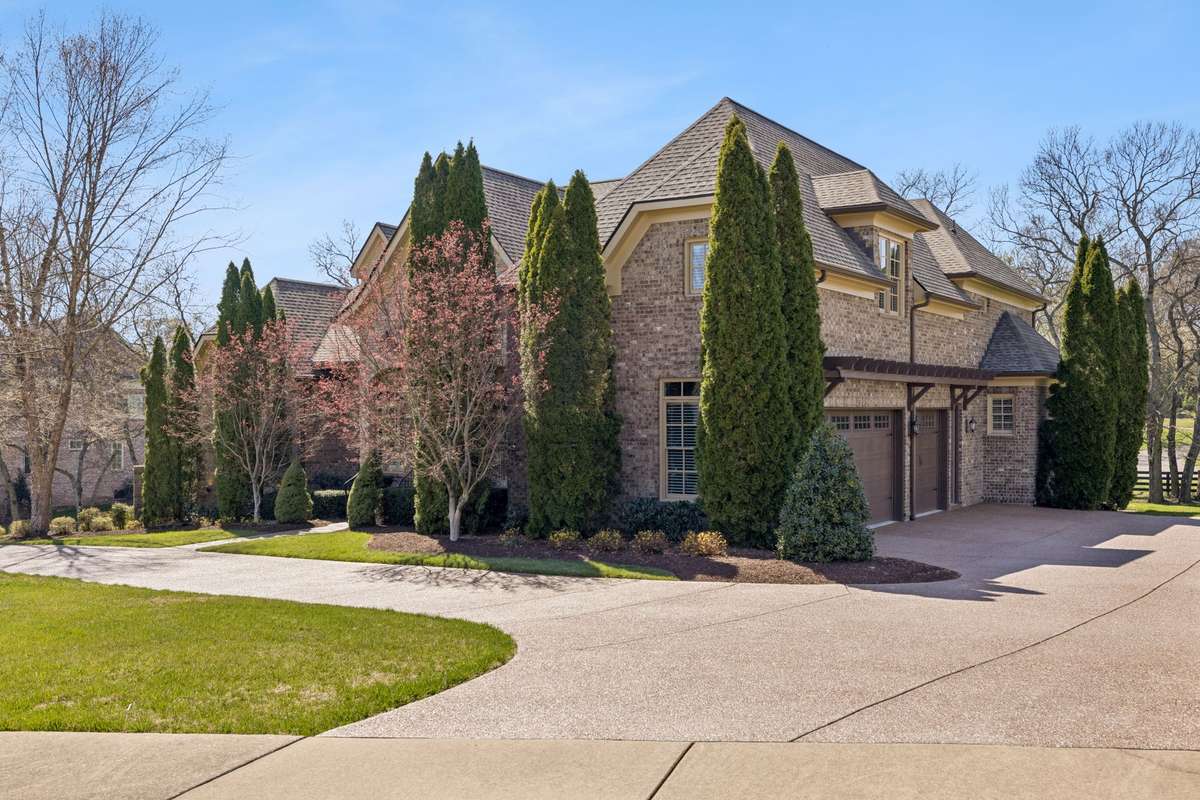 Three car garage with extra parking at the end of the driveway.   Very large circular driveway which has recently been sealed.  Also this house sits on a culdesac.  So there is PLENTY of parking when you have a big party!