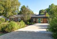 One story 1953 brick home with new roof, HVAC and so much more!