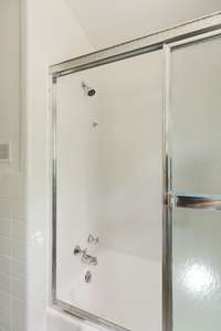 Original steel bathtub has been newly glazed.