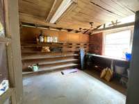 Detached storage building has lots of potential.