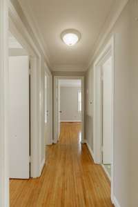 Hallway to bedrooms and bathroom.