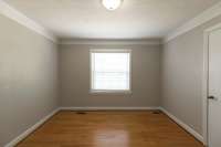 Hardwood floors, crown moulding and new blinds in all bedrooms.