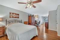 This is another view of the Primary Bedroom. Notice the office area with double closets. There is also an additional walk-in closet.