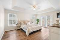Tray ceilings in primary suite. Freshly painted 17x13 primary bedroom.
