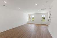 Lots of space means lots of options and flexibility for furniture placement! And we hope you enjoy natural light, because there are oversized windows everywhere! Actual photo of home.