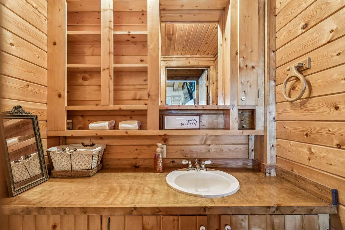 Powder Room located downstairs, just off the living room.