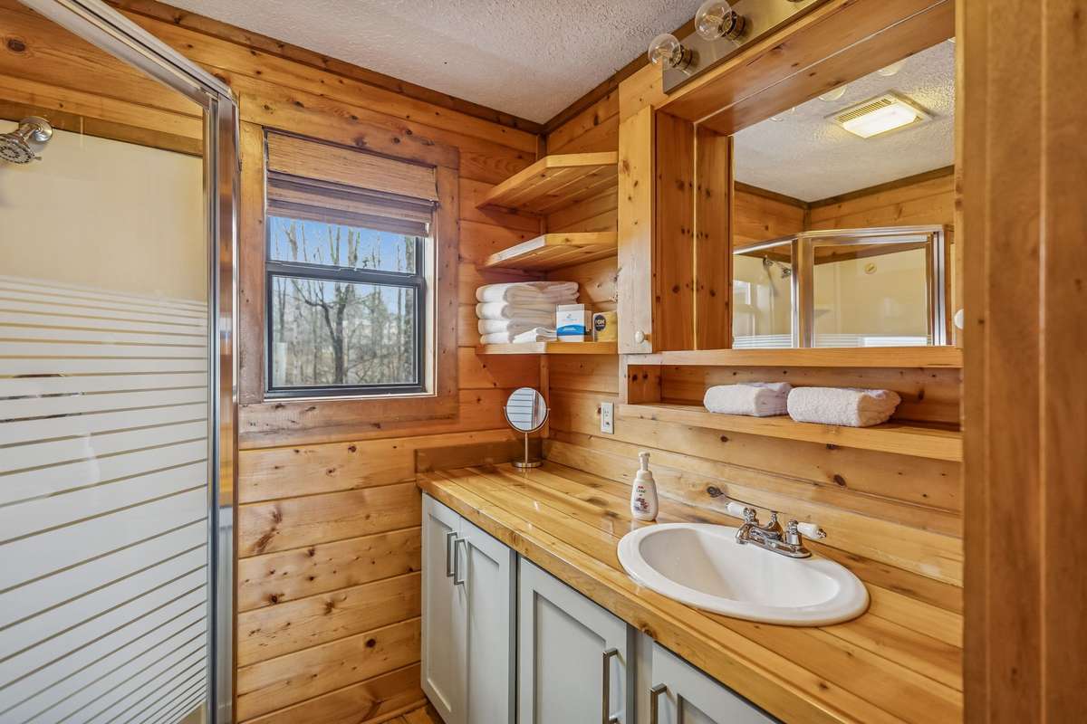 In-law suite bathroom includes walk-in shower.