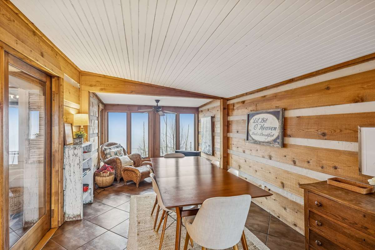 Gathering room off of the kitchen and dining area. Perfect for family game night.