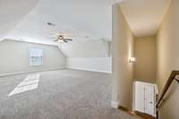 Large bonus room with brand new carpet.