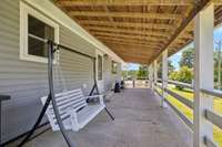 Back to the front porch for another inviting view—perfect for relaxing and taking in the peaceful surroundings.