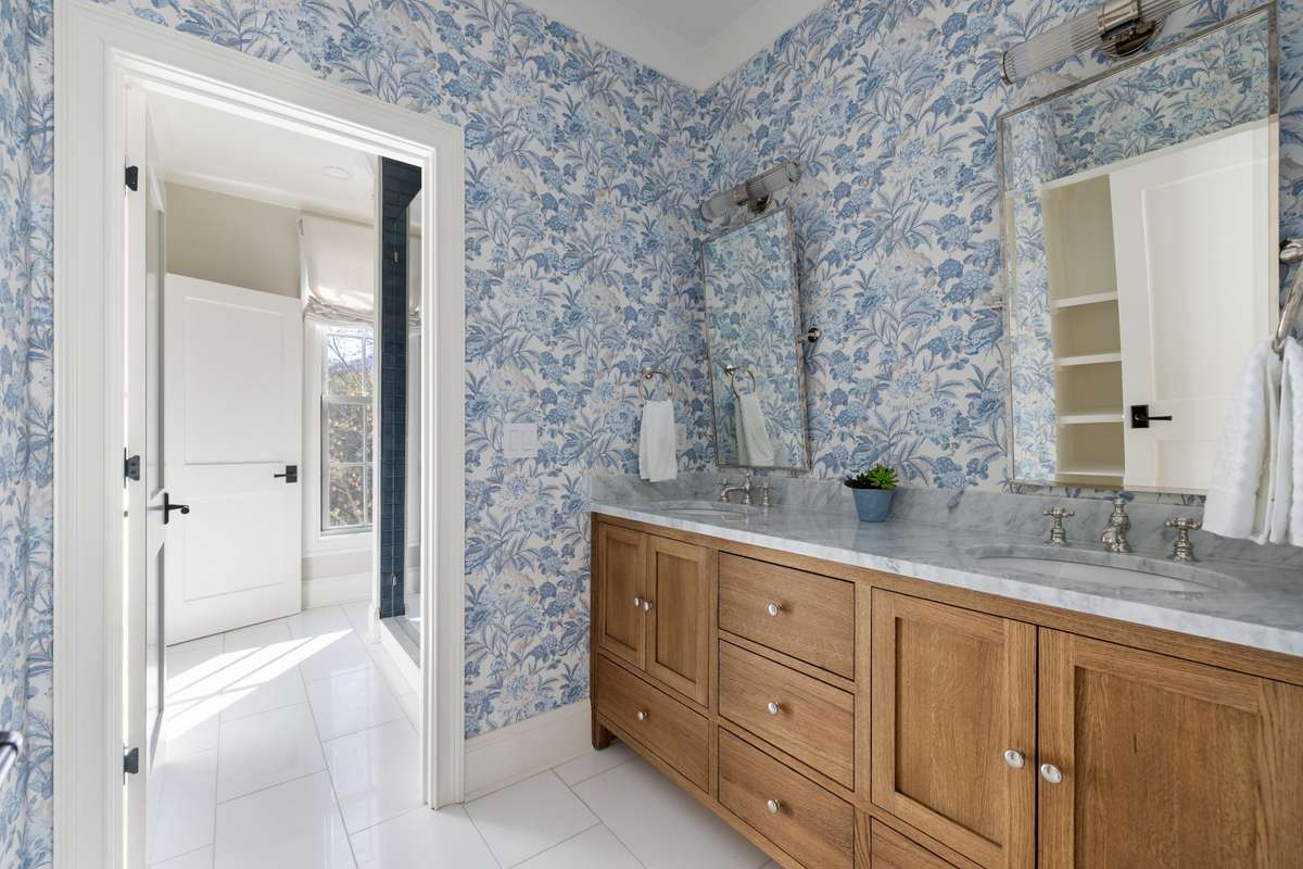 Well-appointed bathroom with custom cabinetry and thoughtfully selected finishes