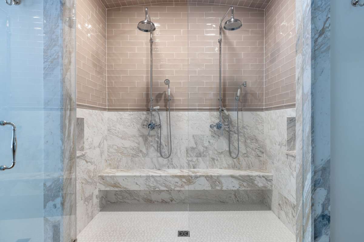 Shower with custom barrel tile ceiling