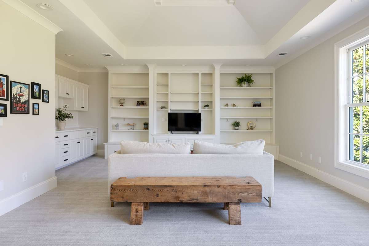 Expansive second level bonus area with custom built-ins and flexible use as well as a powder room