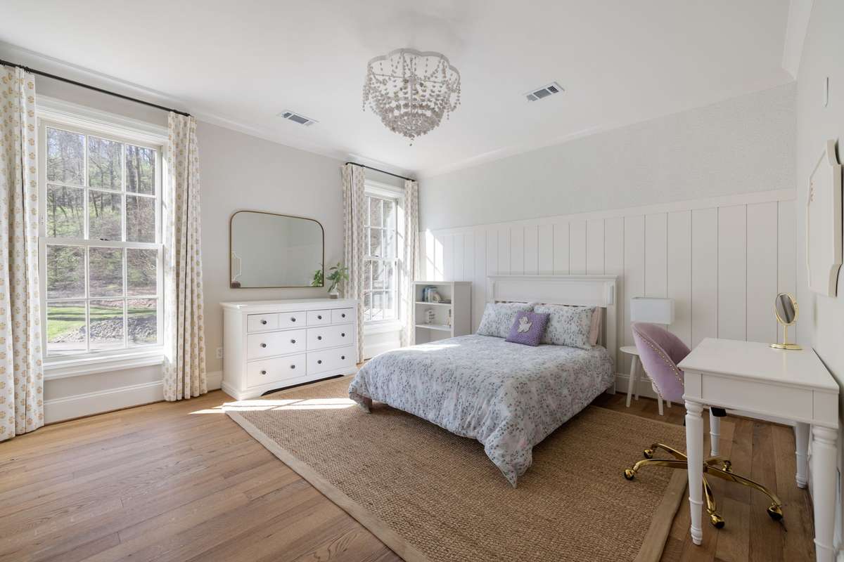 Another bedroom upstairs with en suite bath
