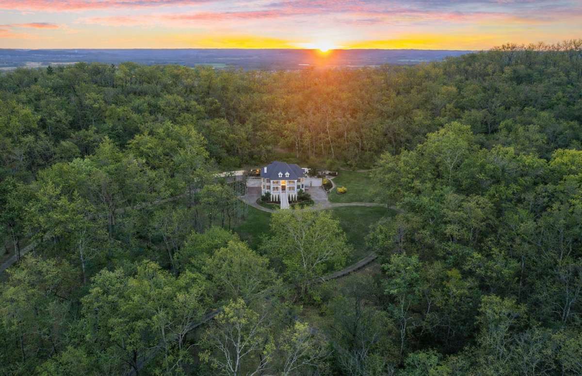 Welcome to 2183 S Berrys Chapel Rd, a private estate on 20 acres in Franklin