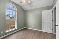 A ceiling fan ensures all-season comfort.