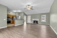 High ceilings elevate the room’s openness, while a ceiling fan and direct
access to the covered deck create an effortless blend of comfort and functionality.