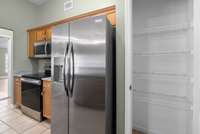 Don’t miss the nearby pantry which provides excellent storage.